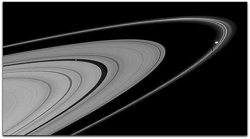 Cassini orbiter photos Saturn's moons