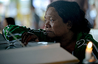 Floods in Philippines carrying lady