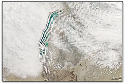 Cassini clouds over Aral Sea