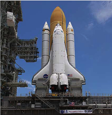 Discovery poised